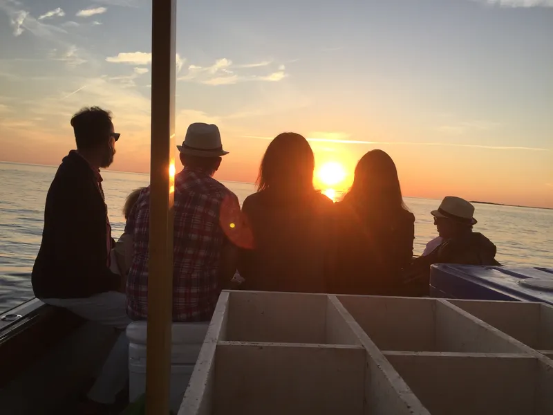 Charter Guests looking at sunset